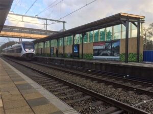 Senzart - Bedrijfsreclame - bouwmuur bestickering